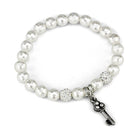 Antique silver brass women's bracelet featuring pearl beads and a decorative key charm