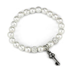Antique silver brass women's bracelet featuring pearl beads and a decorative key charm