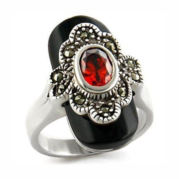 Antique tone red stone silver ring featuring an intricate design and sparkling accents