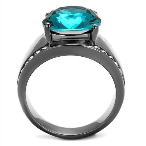 Elegant women's aqua blue crystal ring with a large centerpiece and sparkling accents