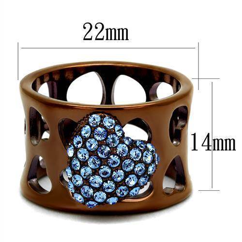 Aquamarine crystal ring in a brown metal setting with heart-shaped embellishments