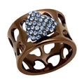 Stylish aquamarine crystal ring with a heart-shaped design and intricate cutout detailing