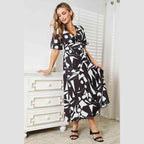 Trendsi women's balloon sleeve vacation dress in a modern black and white geometric print