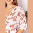 Stylish women's balloon sleeve vacation dress with a chic abstract pattern and a flattering fit