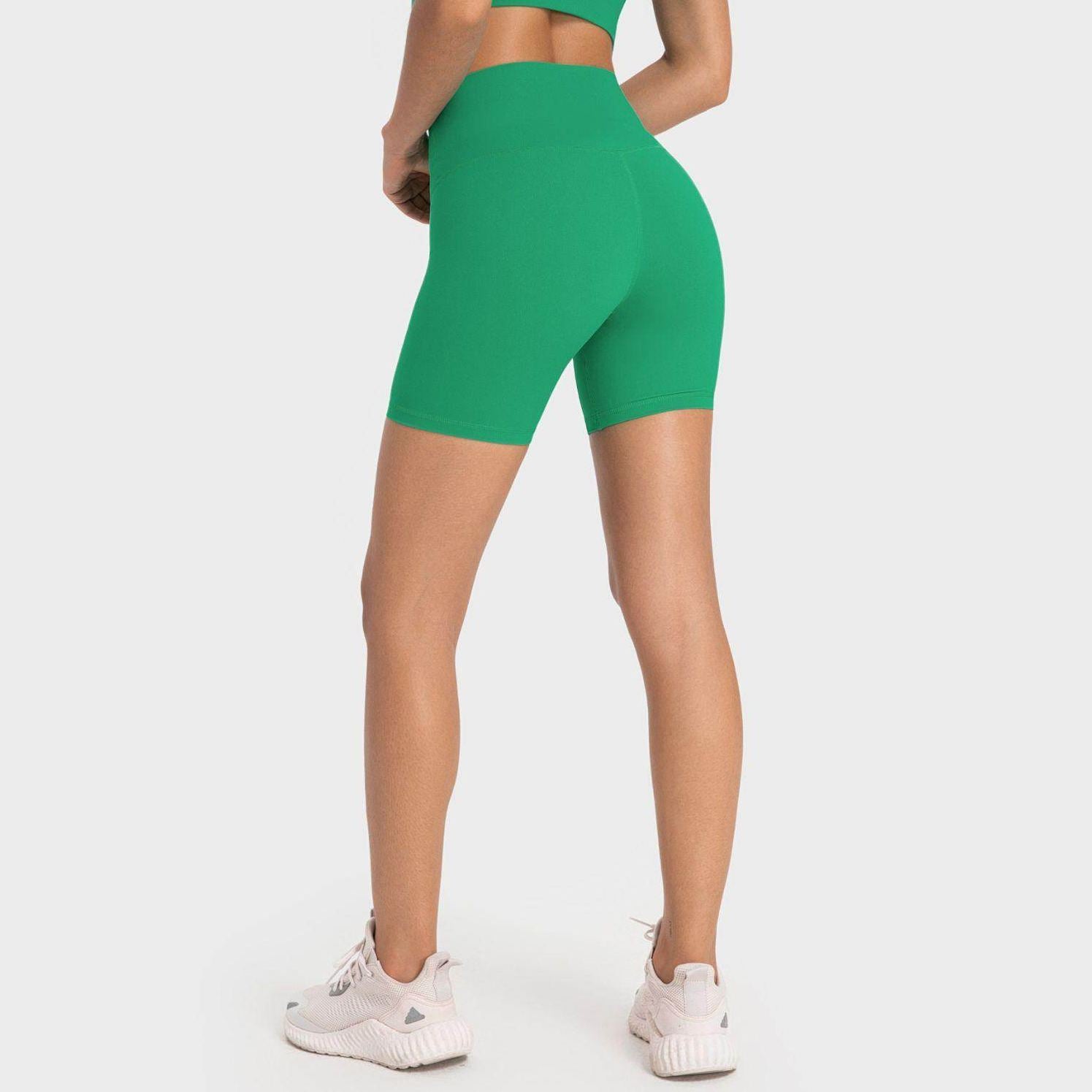 Trendsi high-rise biking shorts in vibrant green for stylish and comfortable workouts