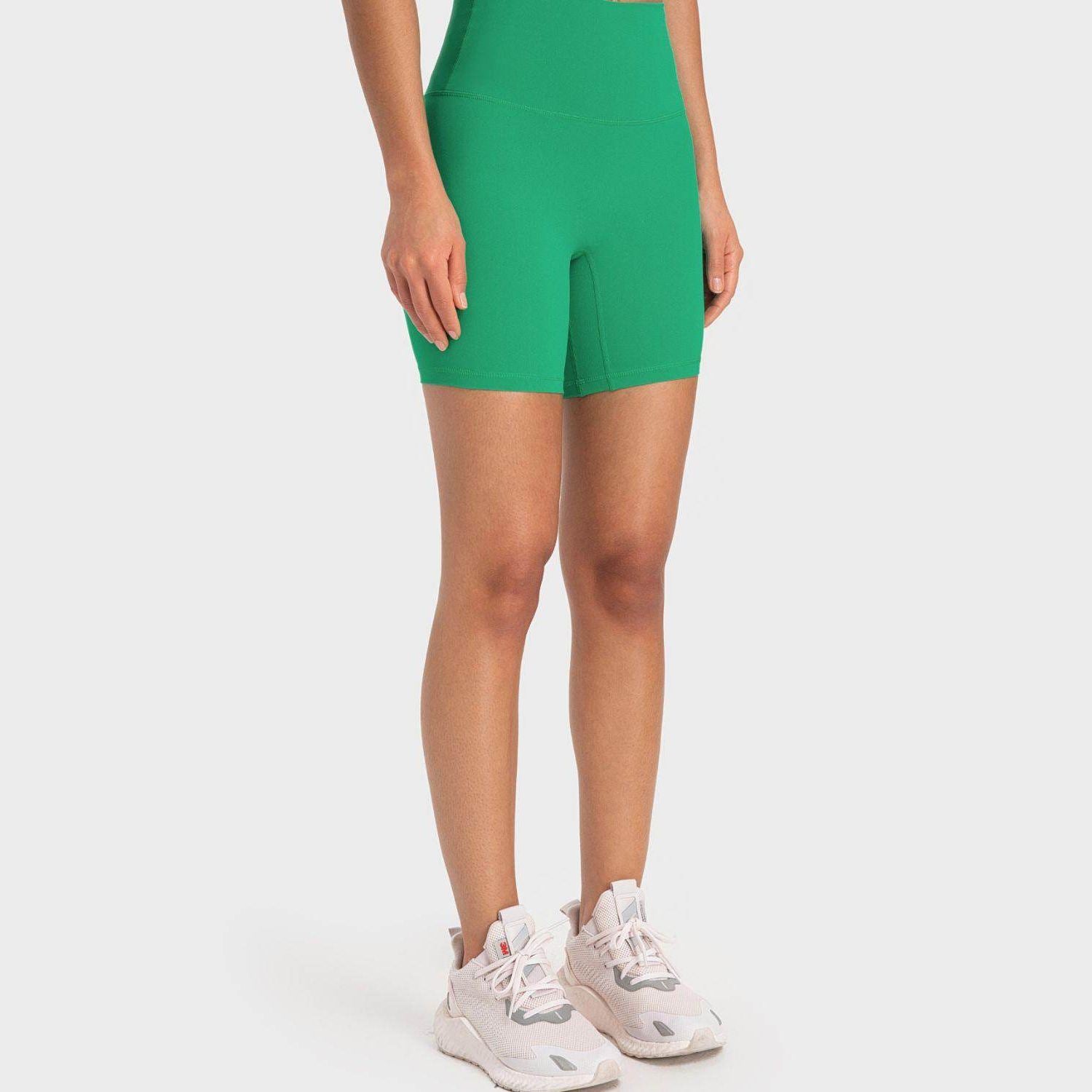 Trendsi high-rise biking shorts in vibrant green for comfortable workouts and cycling activities