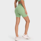 Trendsi high-rise biking shorts in green, perfect for workouts and casual wear