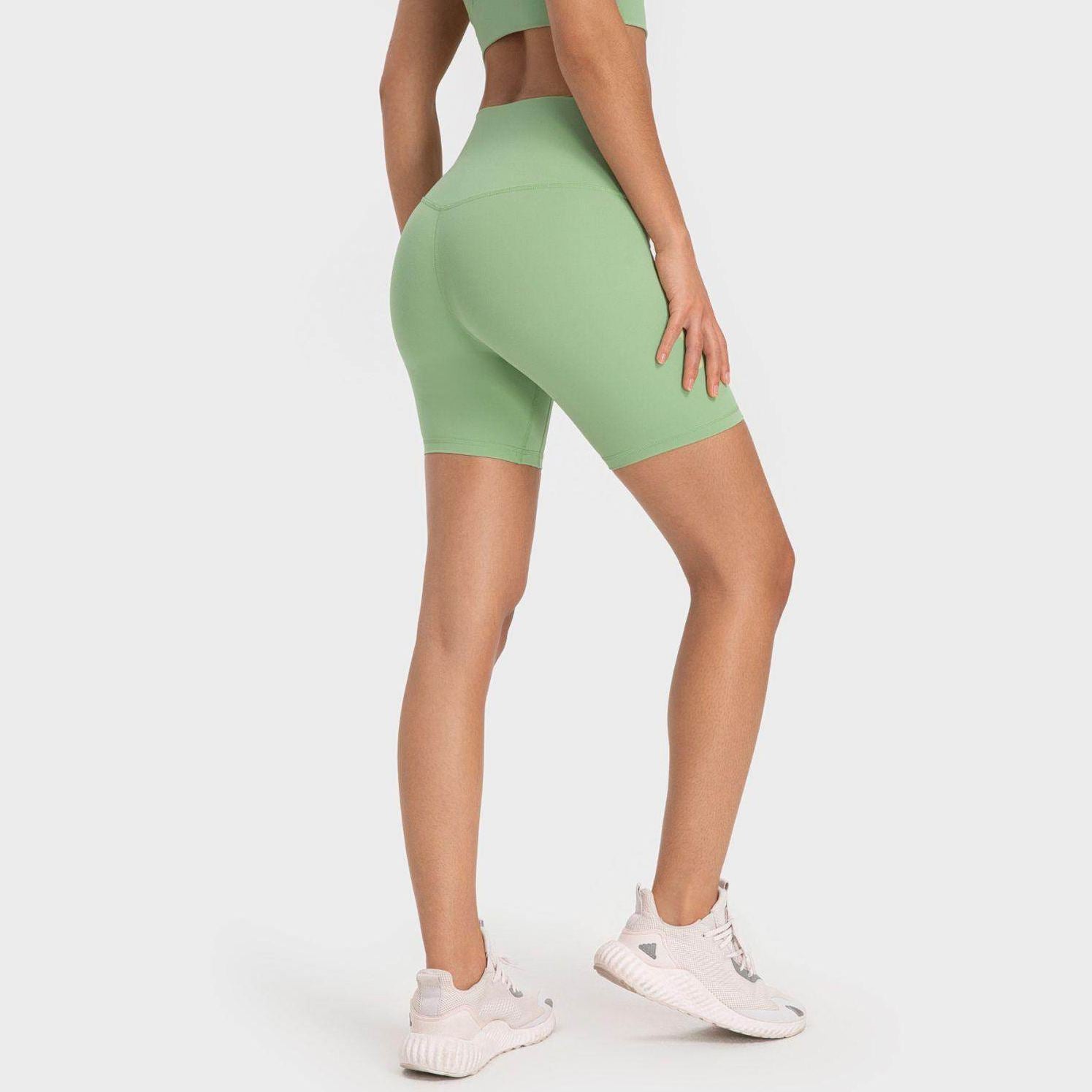 Trendsi high-rise biking shorts in green, perfect for workouts and casual wear