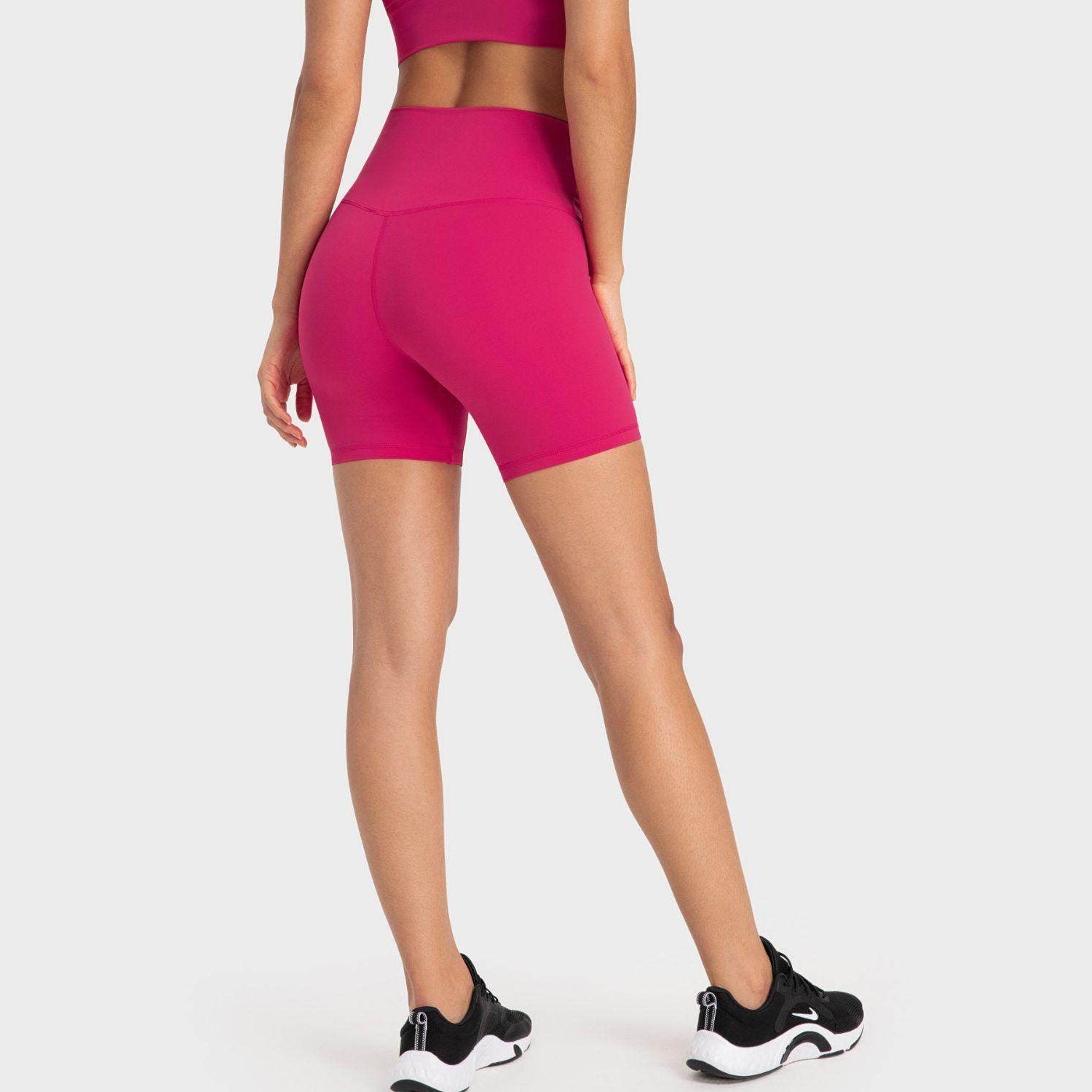 Trendsi high-rise biking shorts in vibrant pink designed for comfort and style during workouts
