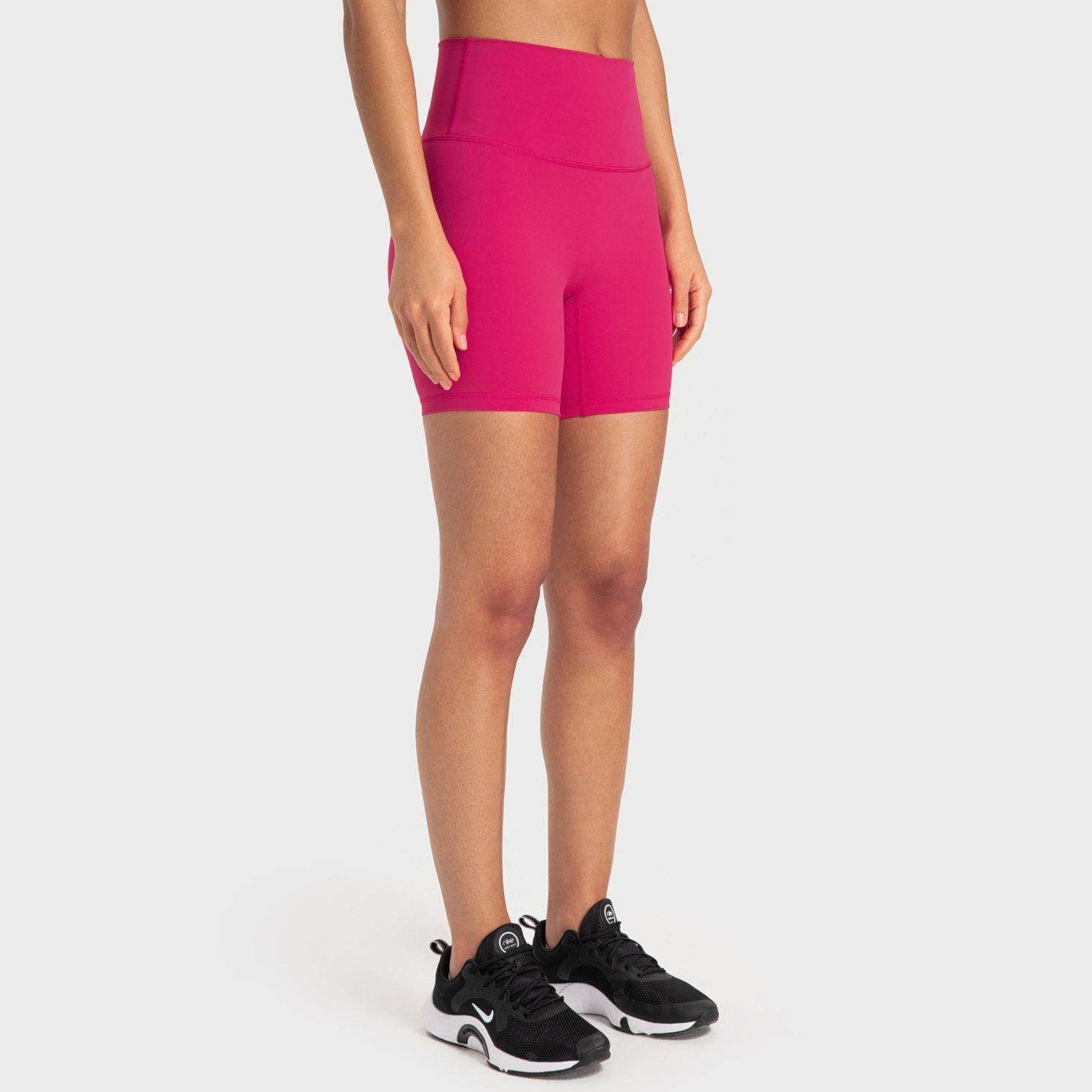Trendsi high-rise biking shorts in vibrant pink, perfect for workouts and casual wear