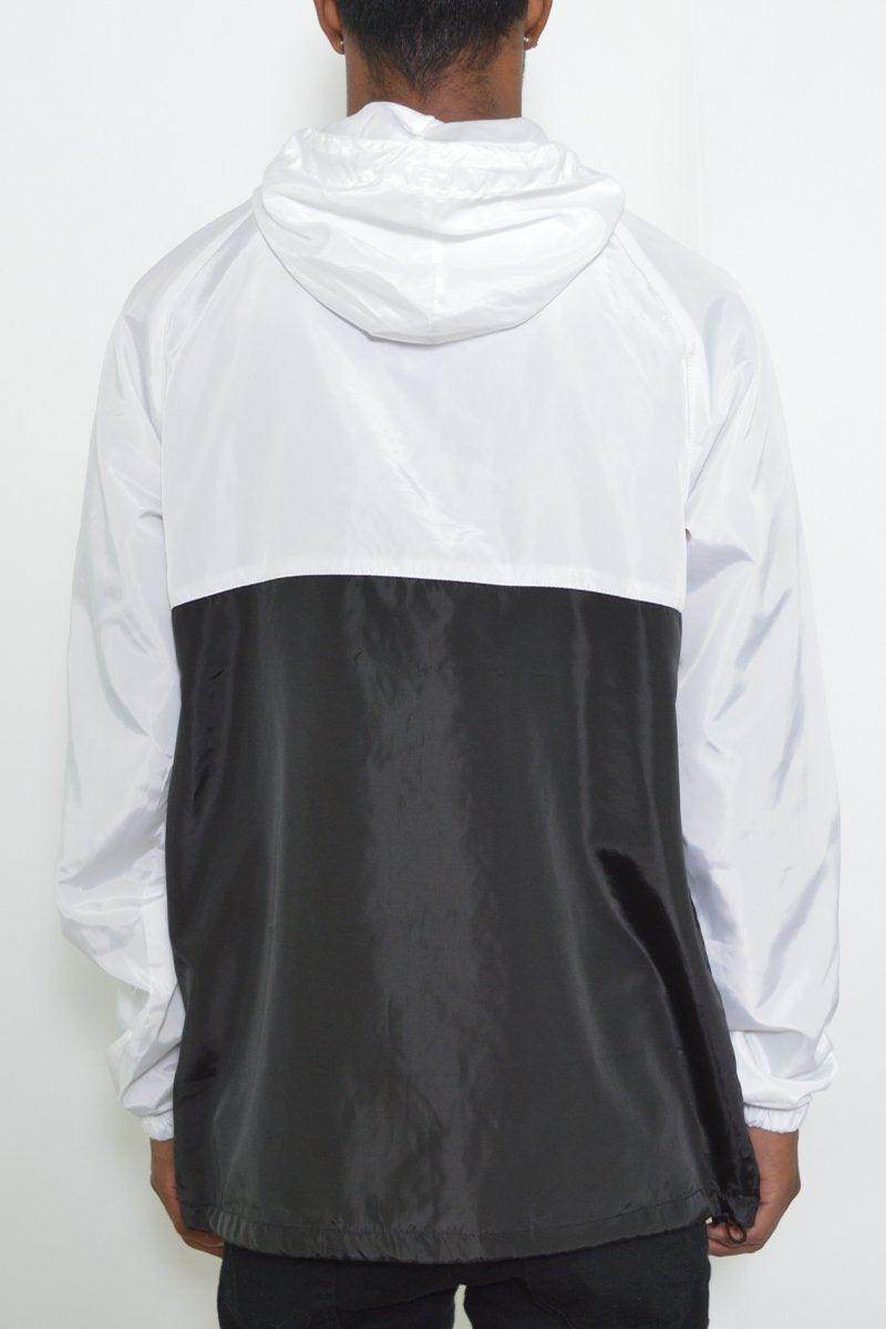 Back view of a black and white anorak for men made of lightweight fabric