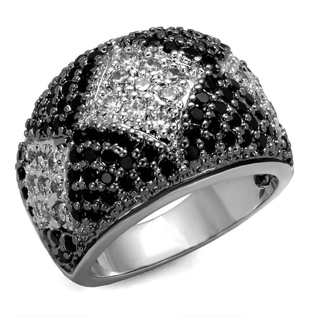 Black and white brass statement ring featuring intricate design and sparkling gems