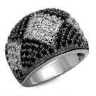 Black and white brass statement ring featuring intricate design and sparkling gems