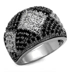 Black and white brass statement ring featuring intricate design and sparkling gems