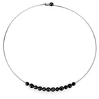 Black beaded minimalist necklace featuring a sleek design on a silver-toned wire chain