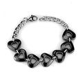 Beautiful black heart link bracelet for women with shiny finish and silver chain detail