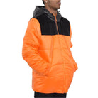 Men's black suede down jacket with vibrant orange body and insulated design for warmth