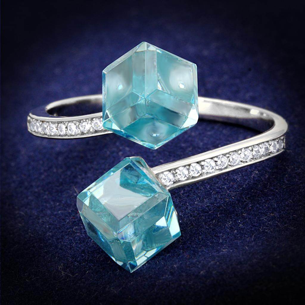 Elegant blue gemstone ring for women featuring two cubic crystals and sparkling accents