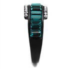 Stunning blue zircon crystal ring with a sleek black band and sparkling accents