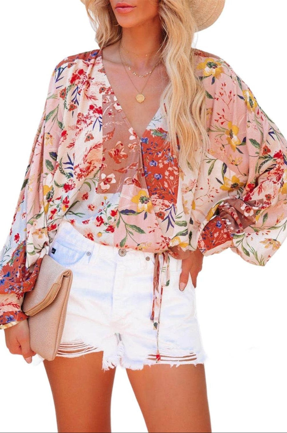 VacationGrabs boho pink floral wrap shirt featuring a colorful floral print and flowy sleeves