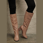 Women's beige high knee boots, sleek design for stylish outings