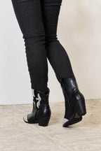 Women's black leather boots pointed toe with silver detailing for stylish outfits