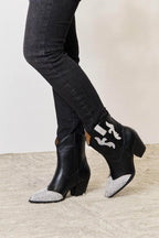 Trendsi women's black pointed toe boots with silver detailing for stylish outings