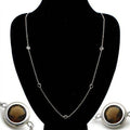Elegant brass chain necklace for women featuring circular accents and a sleek design
