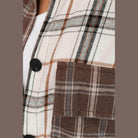 Brown plaid oversized shacket with button closure and chest pocket detail