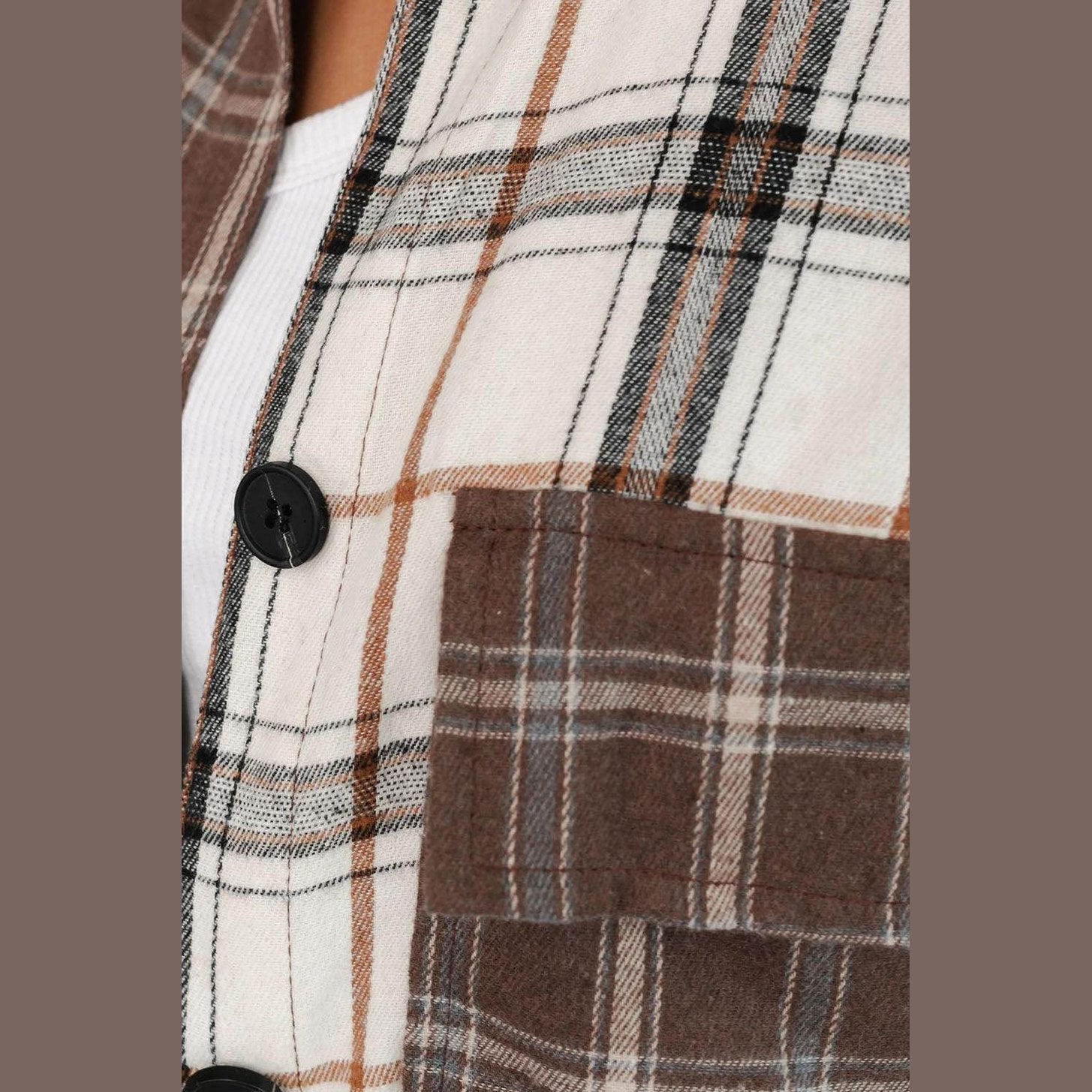 Brown plaid oversized shacket with button closure and chest pocket detail