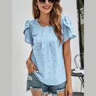 Trendsi women's casual pink Swiss dot top with short puff sleeves for a stylish look