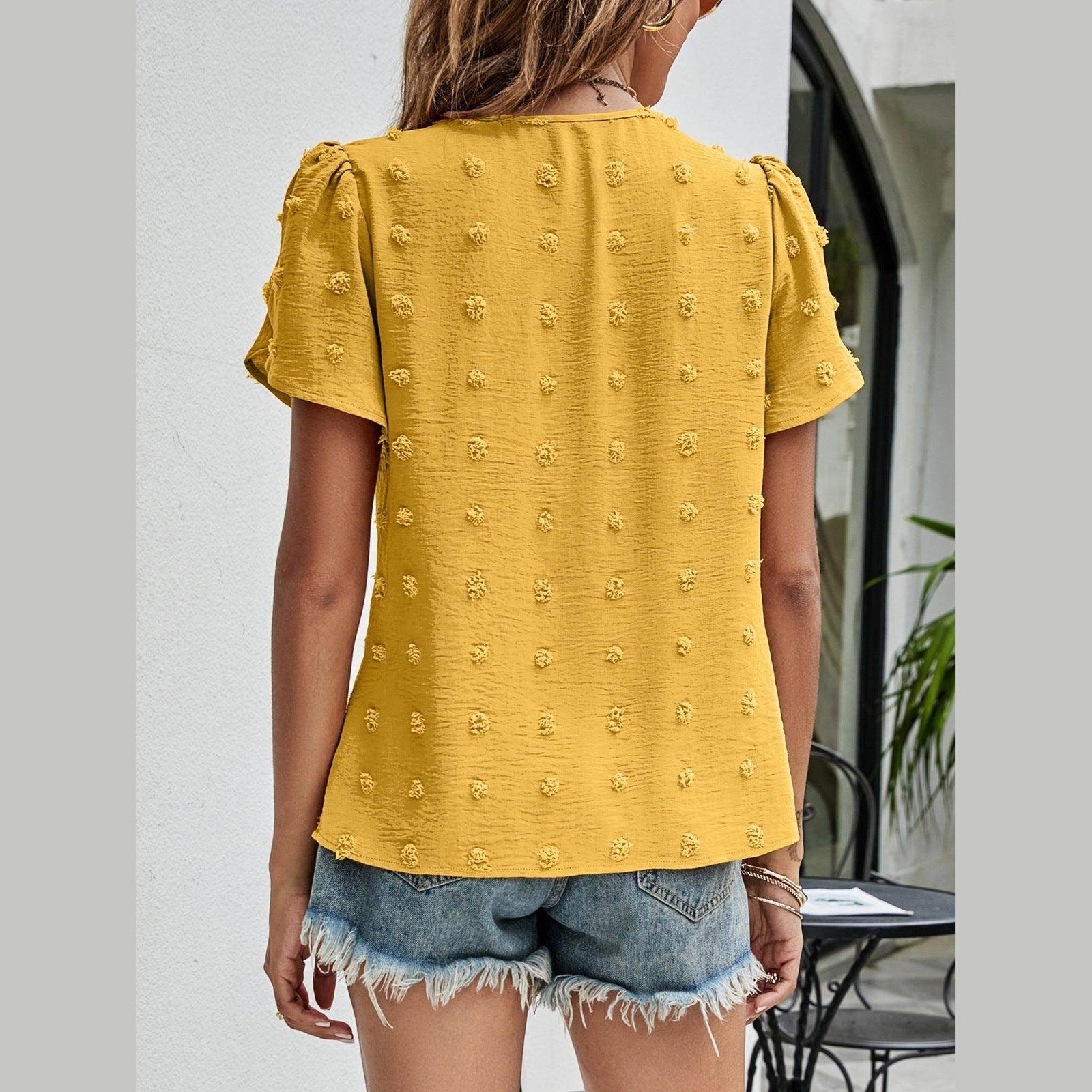 Trendsi casual pink Swiss dot top with textured design and short sleeves for a stylish look
