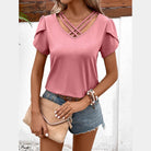 Trendsi casual v-neck vacation shirt in pink with stylish crisscross design and short sleeves