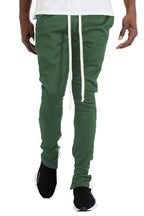 Green VacationGrabs classic track pants for men with a sleek design and elastic waistband