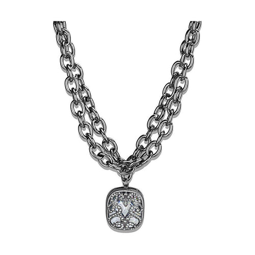 Cobalt black brass necklace featuring a dual chain design and decorative pendant for a stylish look