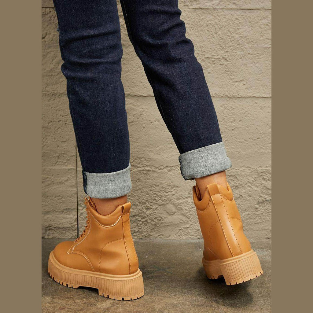 Women's tan combat boots, stylish and durable for everyday wear