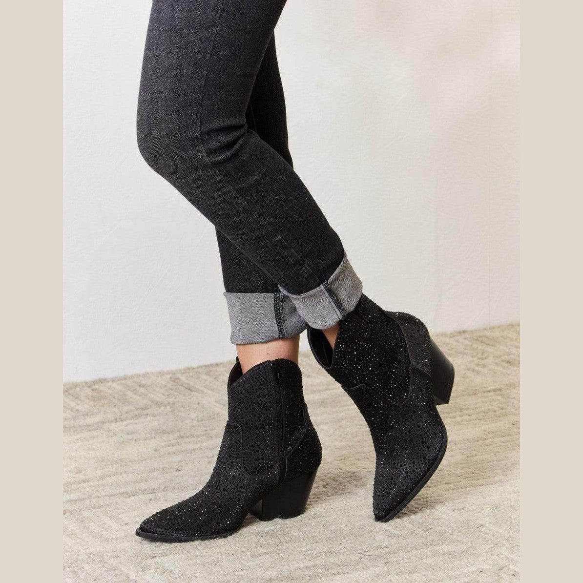 Trendsi women's black cowboy boots with studded detailing for stylish wear