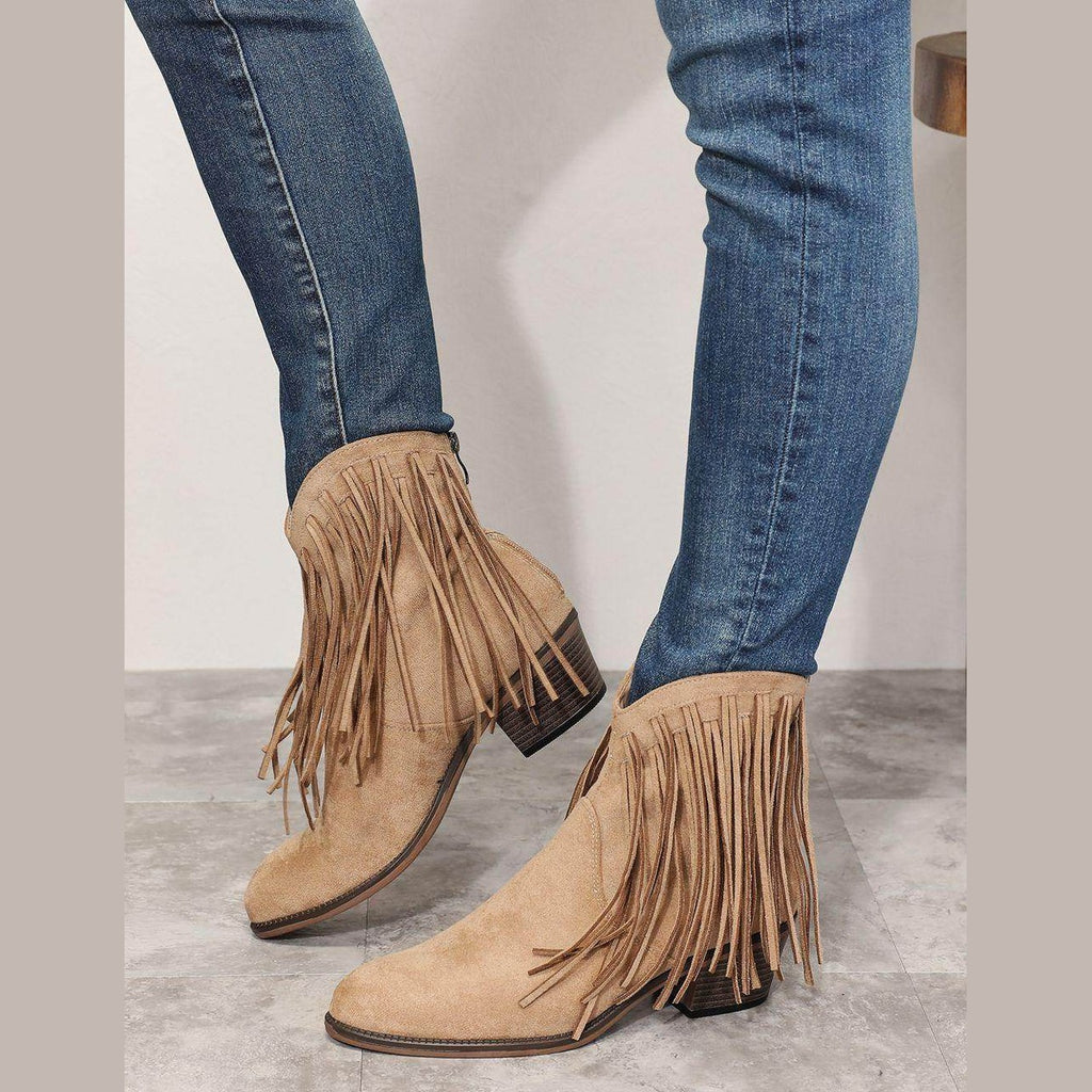 Women's tan cowboy boots with fringe detail for stylish outfits