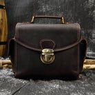 Stylish Crazy Horse leather camera bag with a sturdy handle and brass buckle closure