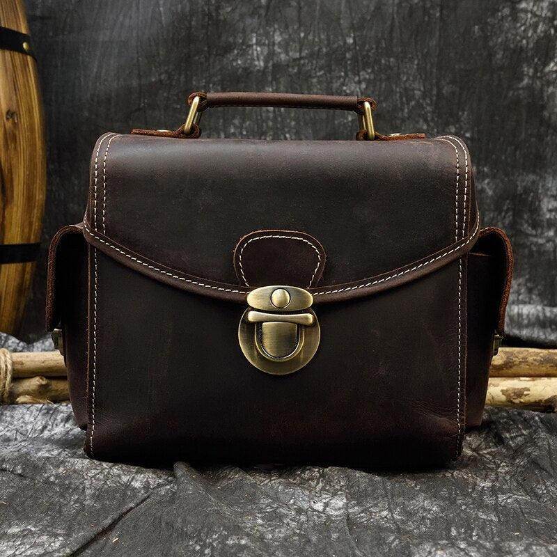 Stylish Crazy Horse leather camera bag with a sturdy handle and brass buckle closure