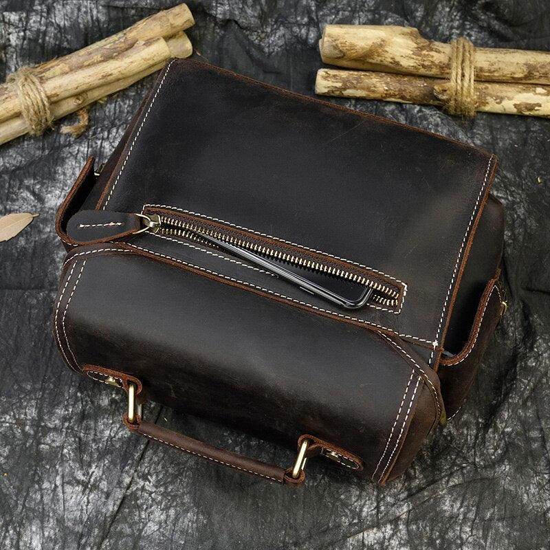 Crazy Horse leather camera bag in dark brown with sturdy stitching and a sleek design for photographers