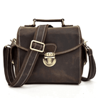 Crazy Horse leather camera bag with adjustable strap and vintage brass lock, perfect for photographers