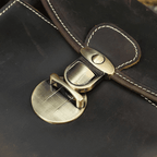 Close-up of the clasp on a Crazy Horse leather camera bag showcasing its durable design and craftsmanship
