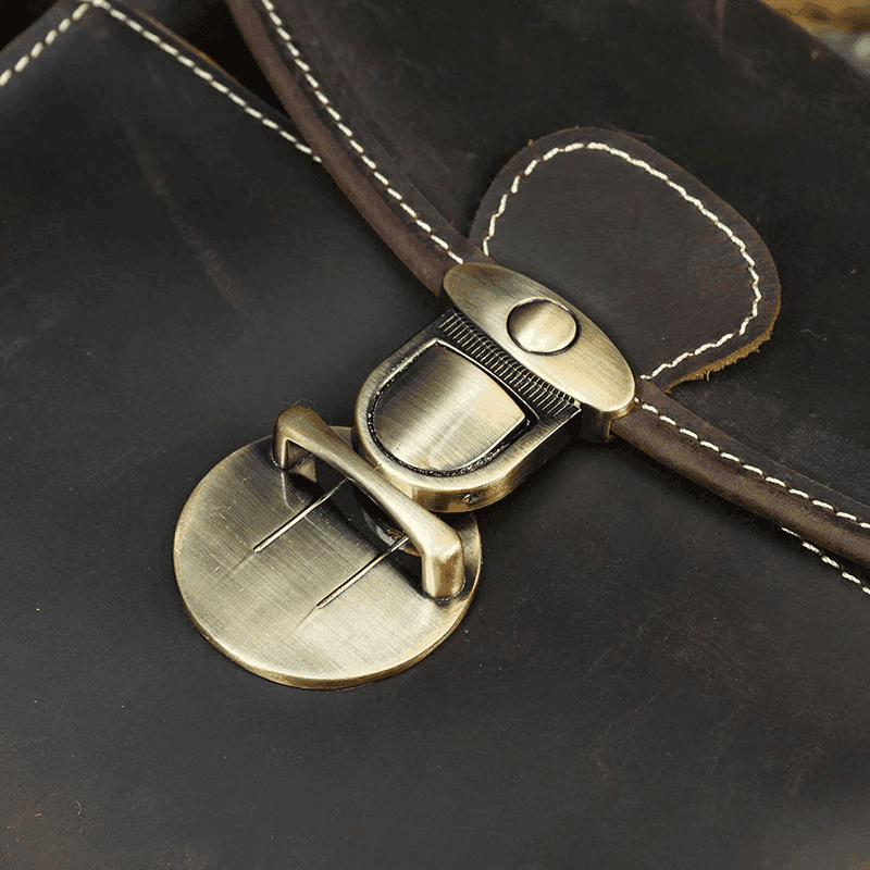 Close-up of the clasp on a Crazy Horse leather camera bag showcasing its durable design and craftsmanship