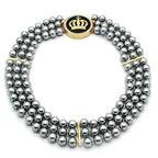 VacationGrabs crown pendant statement jewelry featuring a multi-strand pearl design and gold accents