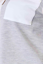 Trendsi women's shirt featuring a curved hem casual blouse in soft gray fabric with a stylish pocket detail