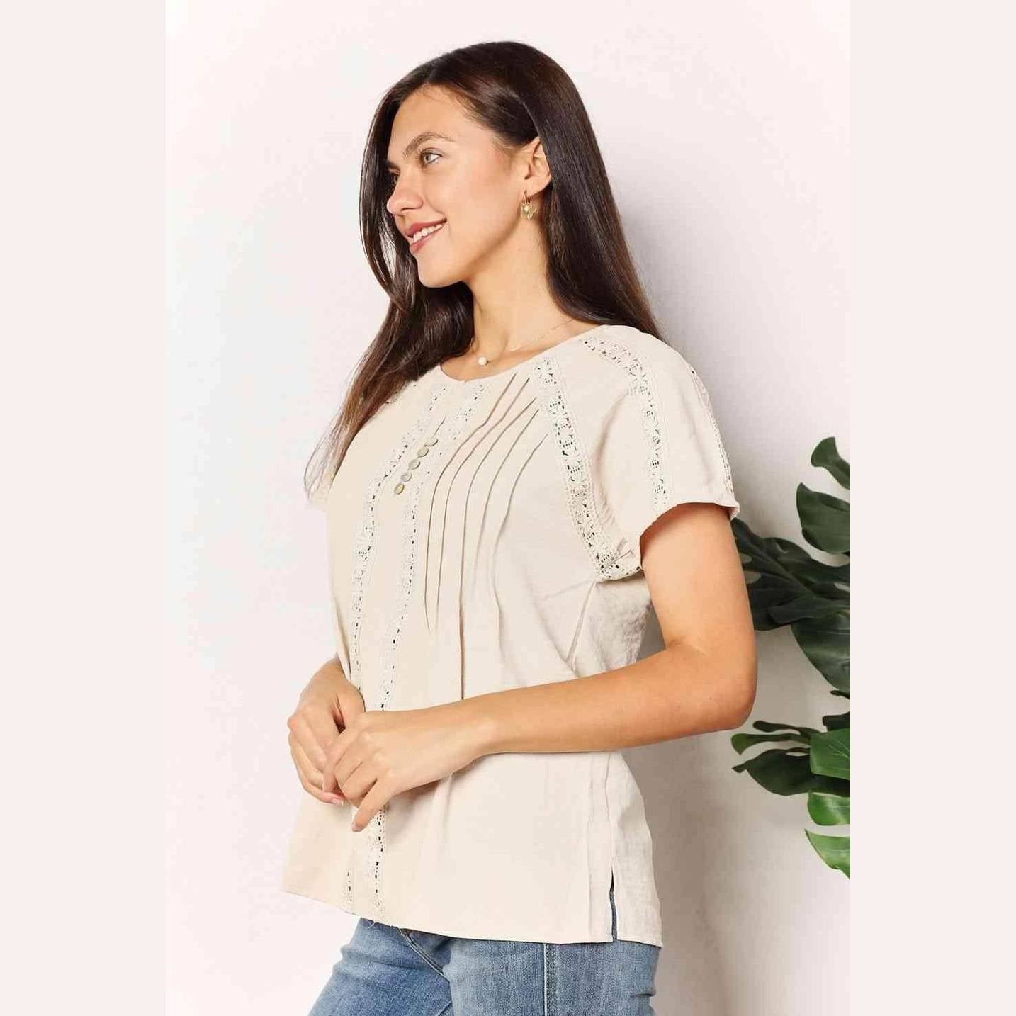 Trendsi double take crochet top featuring decorative pleats and a relaxed fit for a stylish look