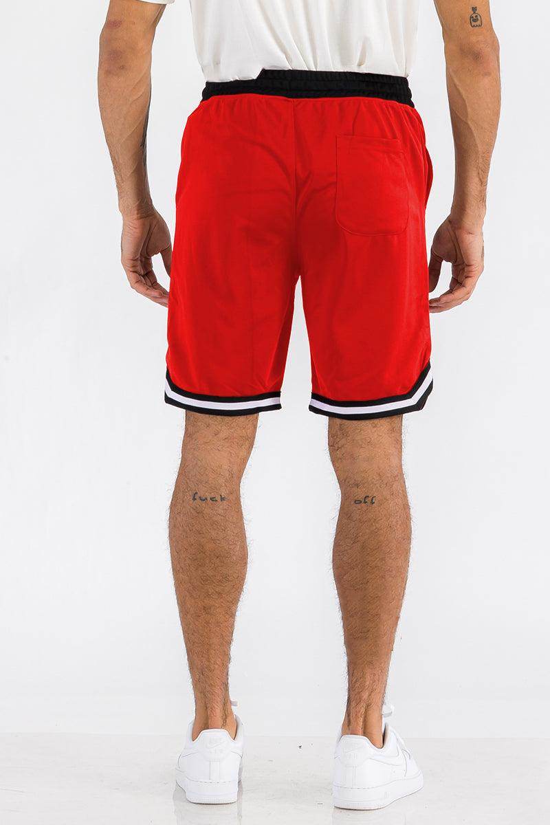 Men's red drawstring gym shorts featuring a comfortable fit and stylish design
