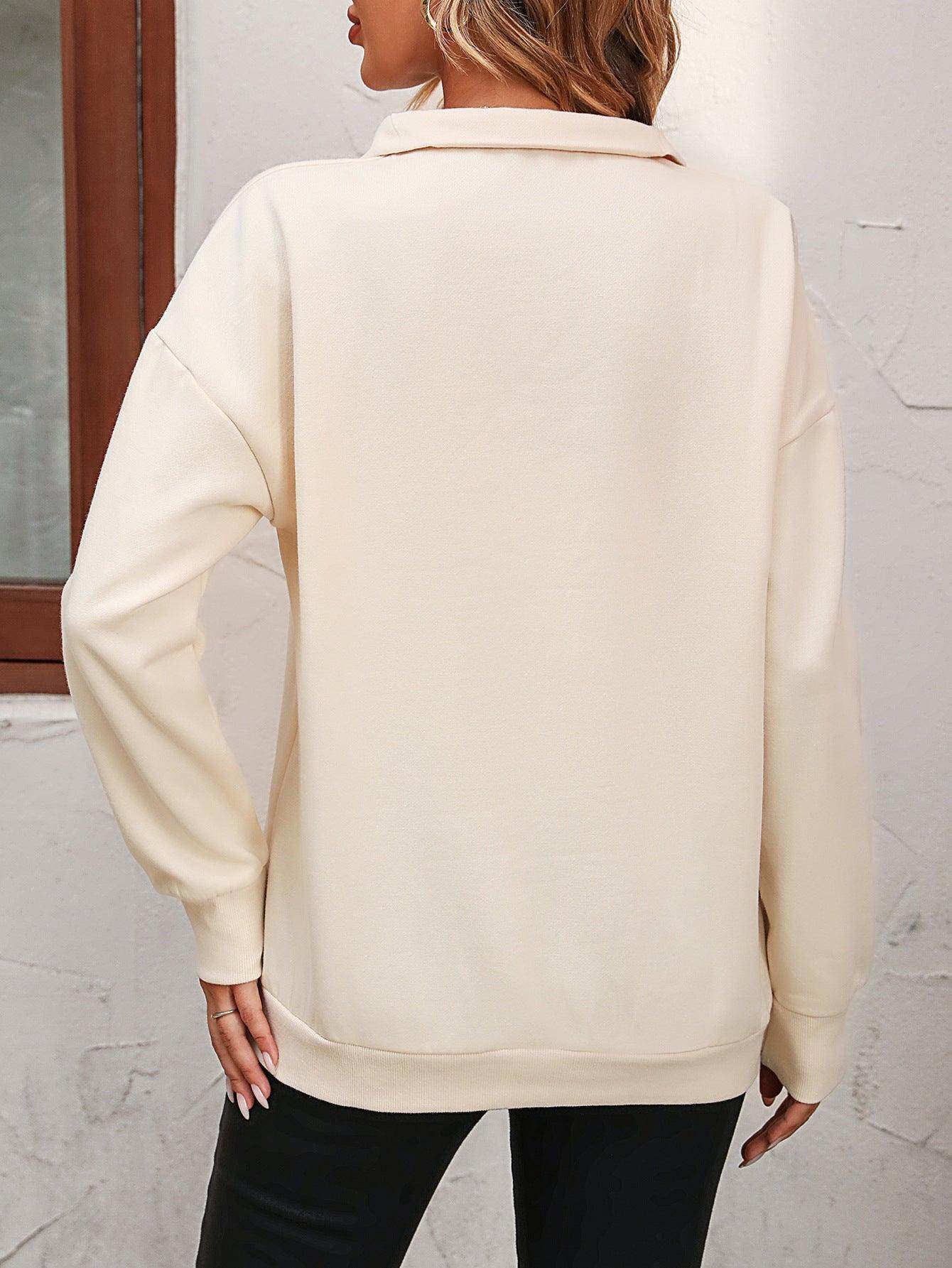 Trendsi women's dropped shoulder pullover top in cream, featuring a relaxed fit and soft fabric