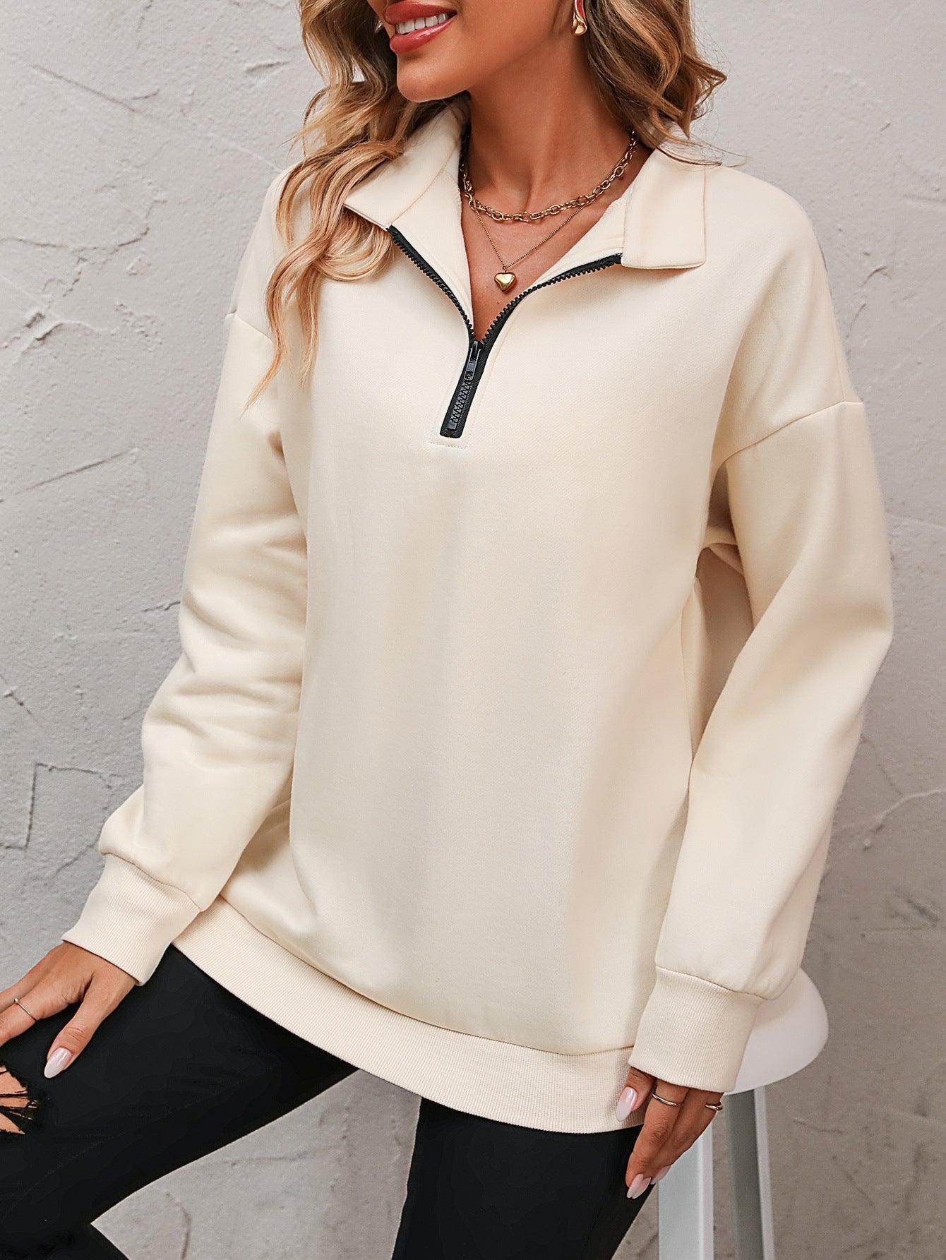 Trendsi women's dropped shoulder pullover top in cream with zip collar and relaxed fit style